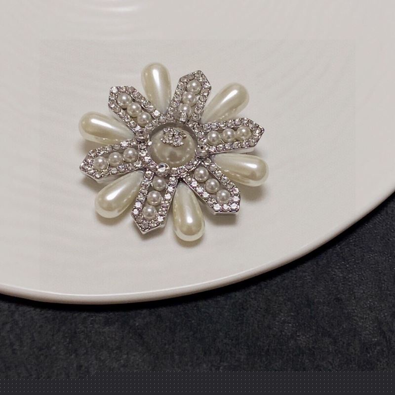 Ch*el brooches